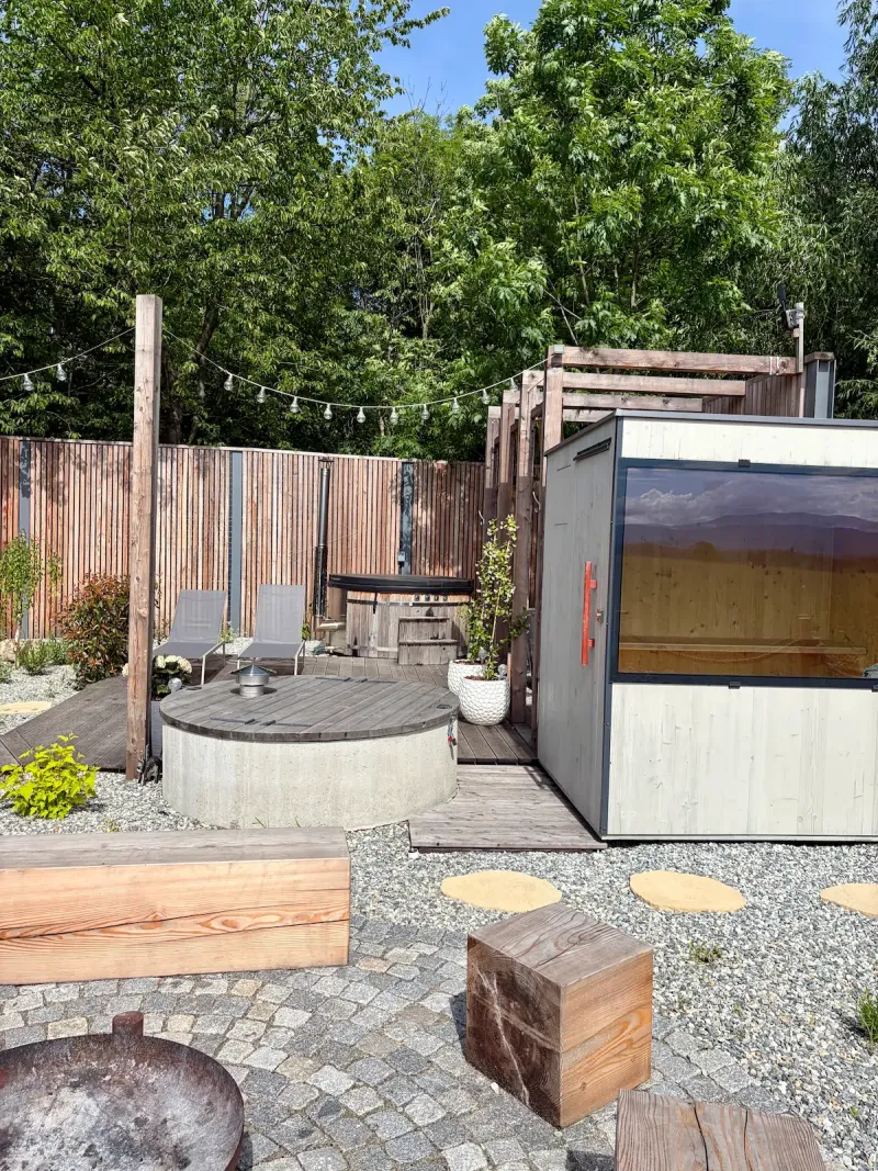 Outdoor wood-fired sauna at Johanka Hutka — wellness in the Rychlebské hory mountains