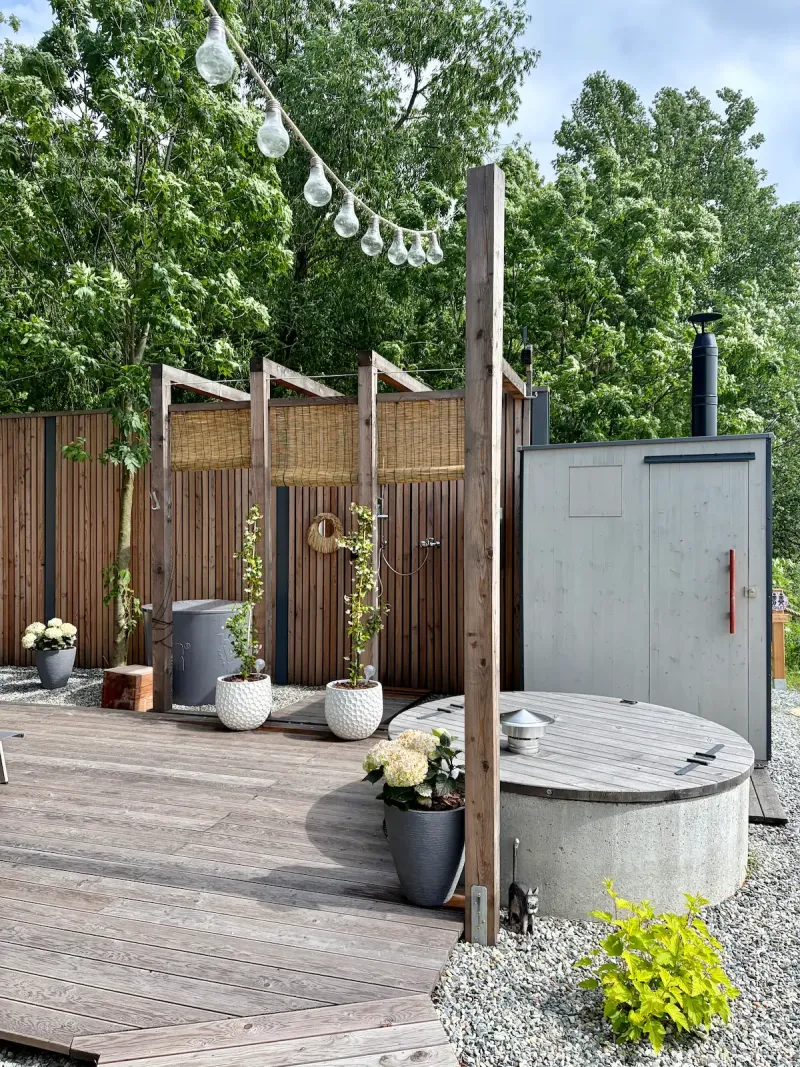 Outdoor shower by the Johanka wellness area — refresh under the open sky